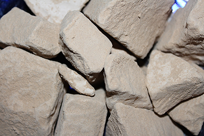 Caliche clay chalk chunks. Caliche is a desert clay dirt that is hard when dry, and a powdery chalk