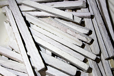 EarthyGoodies slate chalk pencils crunchy and tastes like earthy rock.