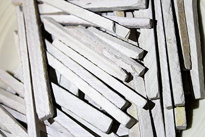 EarthyGoodies slate chalk pencils crunchy and tastes like earthy rock.