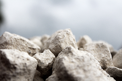 Gritty white clay that is edible and has giant pieces.