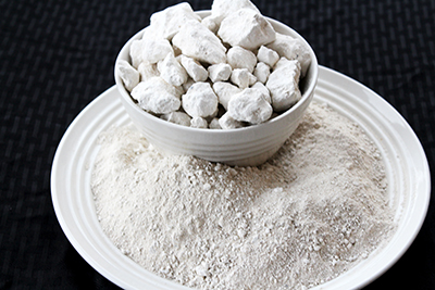 Gritty white clay that is edible and has giant pieces.