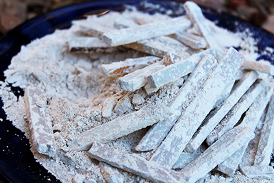 Powdery slate chalk sticks that are edible and tasty